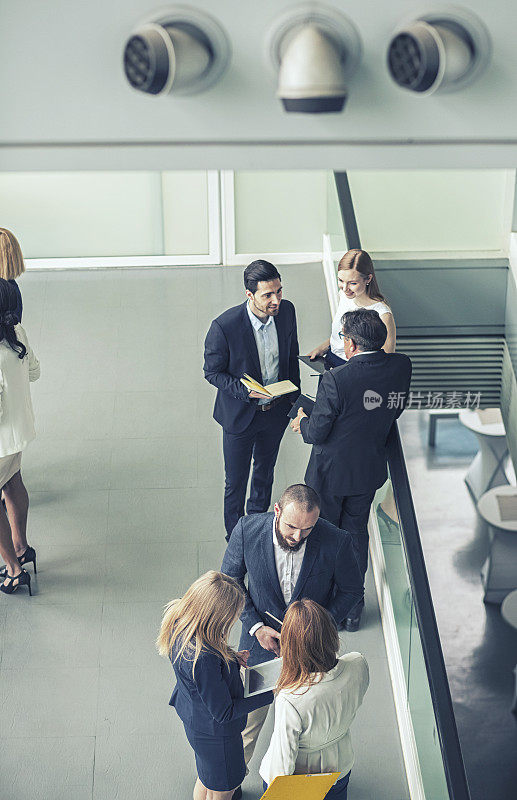 Group of business people in the office building lobby